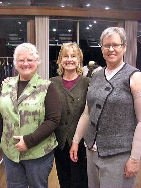 Three ladies in vests